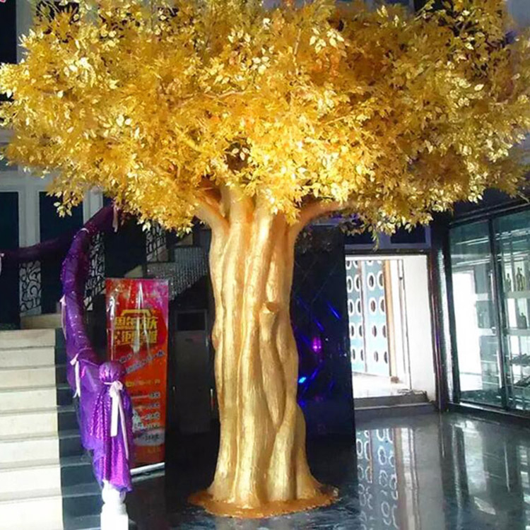 Large indoor golden artificial ficus banyan tree